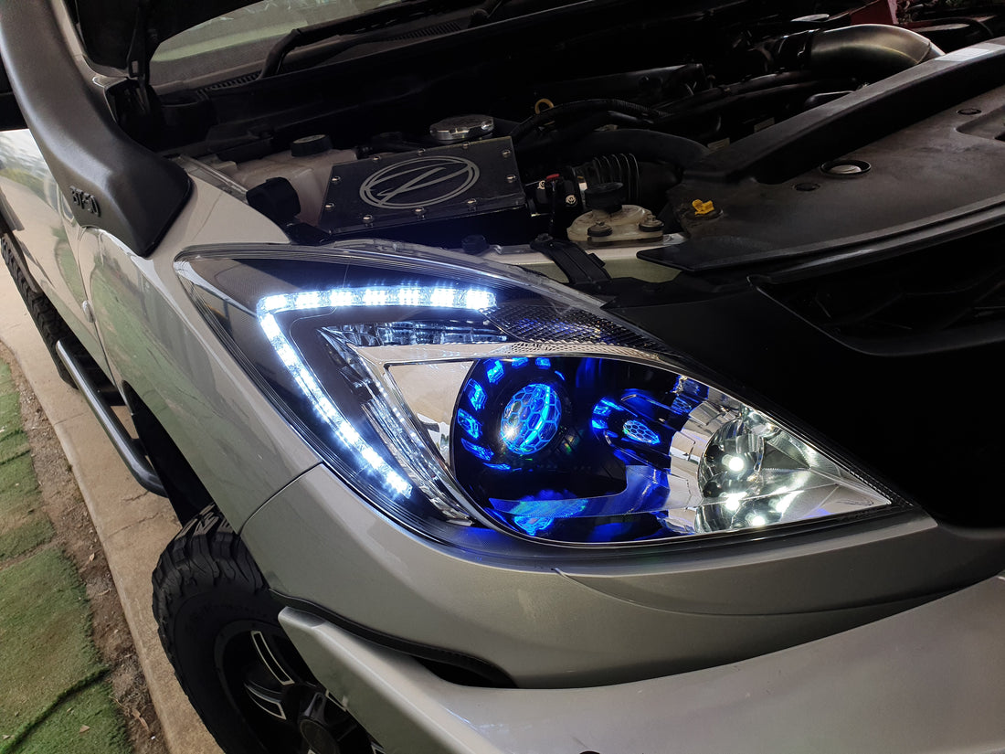 Mazda BT 50 UP 2011-2015 with Turbineshroud Multicolored Halo Rings, Demon Eyes & Honeycomb Lens Etching - Dan's Custom Car Lights 