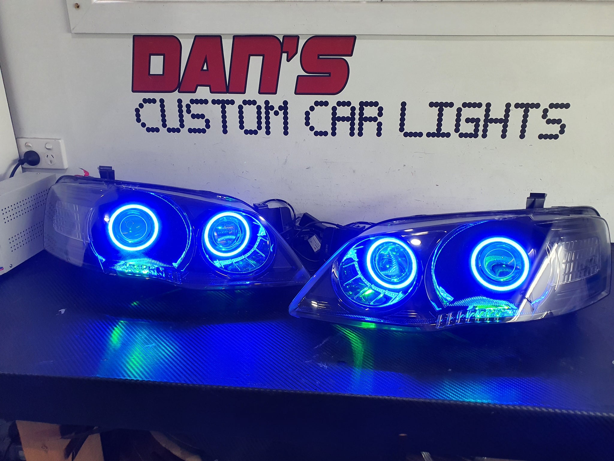 Ford Falcon BF MK2 with Quad Projectors, Quad Multicolored Halo Rings Dan's Custom Car Lights