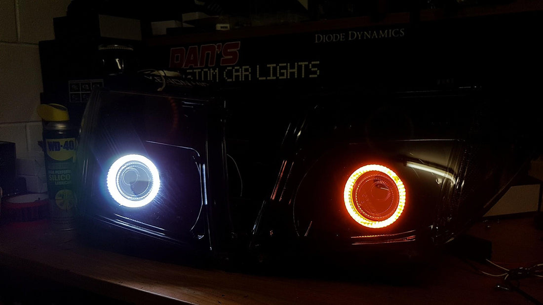 Nissan Navara D40 Thai Headlights Blacked out with Halo Rings and Projectors