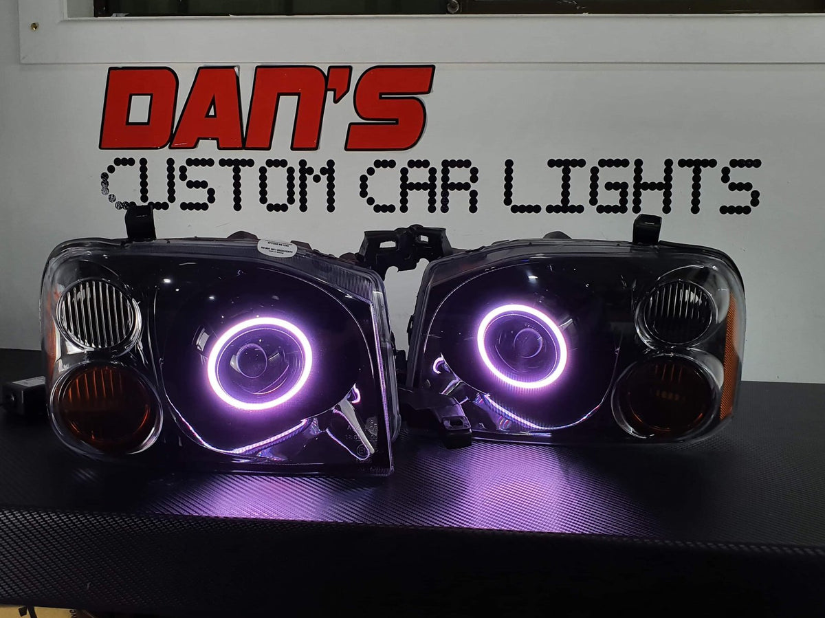 Nissan Navarra D22 Headlights with Multicoloured Halo Rings | Dan's ...